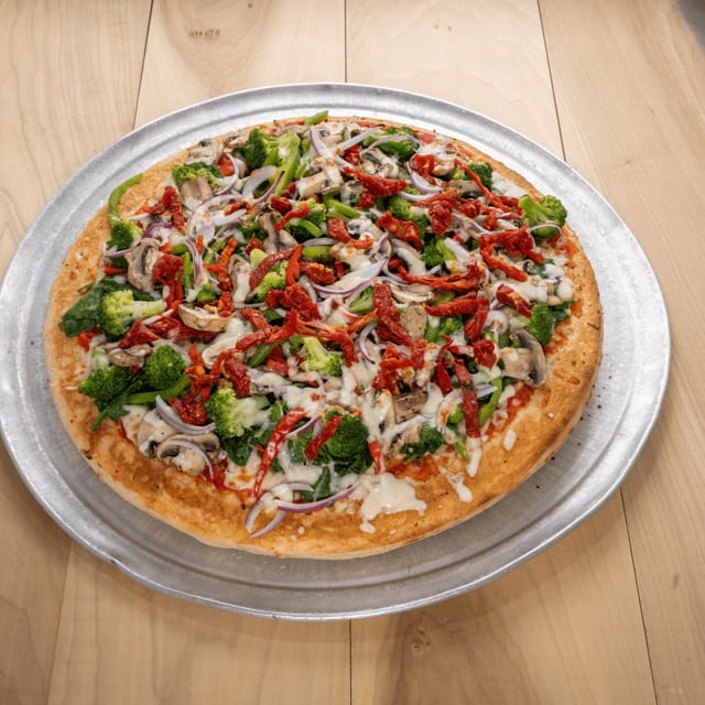 Deep Dish Vegetable Pie with Sun Dried Tomatoes.
