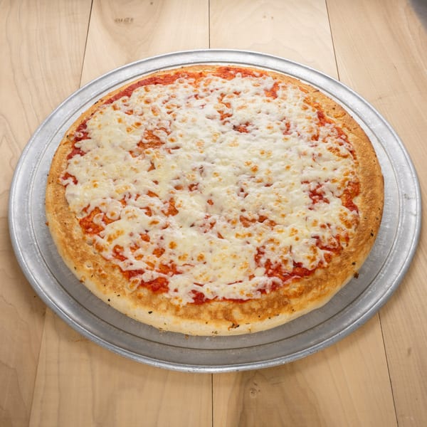 A whole kosher cheese pizza with melted mozzarella and red sauce on a metal pan.